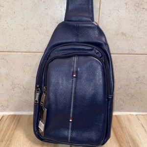 West end brand blue leather crossbody bag. NEVER USED.